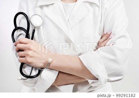 Doctor holding a phonendoscope or stethoscope in his hand 99291182