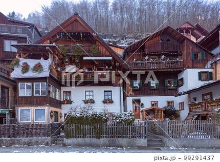 Old wooden houses in the village of Hallstadt at Christmas. Old wooden houses in the village of Hallstadt at Christmas. 99291437