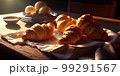 Morning luxury - tempting croissants in golden rays. 3D rendering 99291567