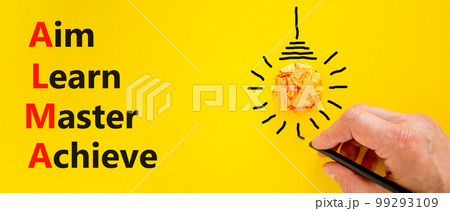 ALMA aim learn master achieve symbol. Concept words ALMA aim learn master achieve on yellow paper on beautiful yellow background. Business ALMA aim learn master achieve concept. Copy space. 99293109