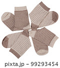 Two pairs of socks, half folded and lying in a circle, in the shape of a camomile, on a white background 99293454