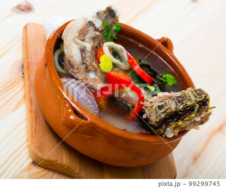 Spicy chorba (shurpa) with lamb meat 99299745