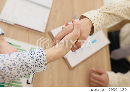 The handshake of business people in the office, close-up The handshake of business people in the office, close-up 99304120