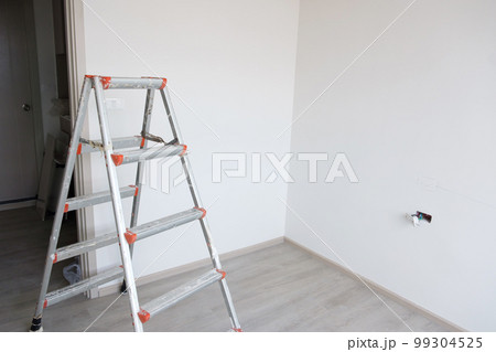 Ladder at construction site building. Renovation, Repair and development of home and apartment concepts 99304525