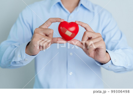 man hand holding red heart shape. love, donor, world heart day, world health day and Insurance concepts 99306498