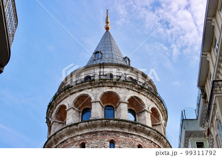 Famous tourist place Galata tower in Istanbul in Turkey. The European part of Istanbul. Sights of Istanbul Famous tourist place Galata tower in Istanbul in Turkey. The European part of Istanbul. Sights of Istanbul 99311792