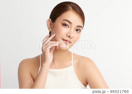 Beautiful young asian woman with clean fresh skin on white background, Face care, Facial treatment, Cosmetology, beauty and spa, Asian women portrait. 99321760