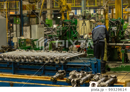 Cardan shafts and gimbal transmissions moving on conveyor 99329614