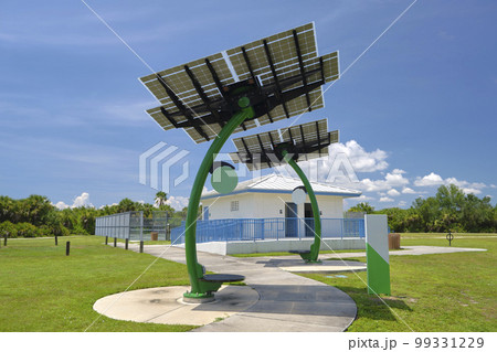 Solar photovoltaic panels mounted on city street pole for electricity supply of streetlights and surveillance cameras Solar photovoltaic panels mounted on city street pole for electricity supply of streetlights and surveillance cameras 99331229