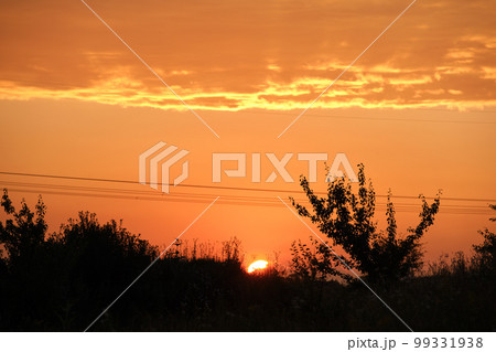 Dark silhouette of high voltage towers with electric power lines at sunrise. Dark silhouette of high voltage towers with electric power lines at sunrise. 99331938