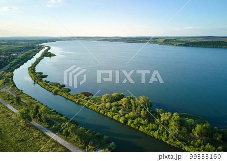Aerial view of fish hetching pond with blue water in aquacultural area 99333160