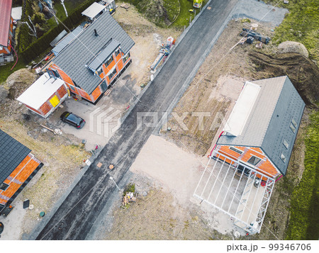 Top down view of new modern houses under construction in the suburbs 99346706