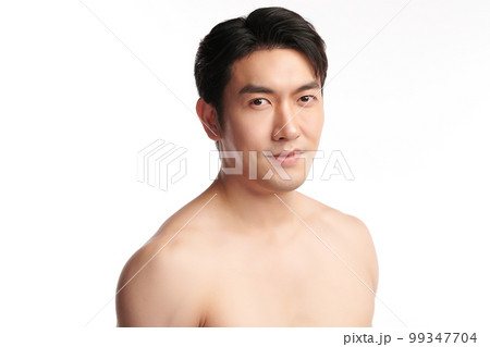 Portrait of shirtless young handsome Asian man for skincare and beauty concepts against on white background, 99347704