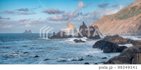 A Panoramic View of Tenerife's Rugged Coastline with a Photogenic Couple 99349341