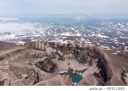 The blue lake in the crater of Gorely volcano. Kamchatka Peninsula, Russia The blue lake in the crater of Gorely volcano. Kamchatka Peninsula, Russia 99351983