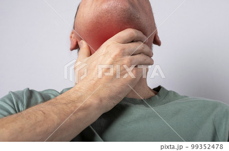 Sore throat. Man hand touching painful neck with red spot closeup. Health problems, medicine concept Sore throat. Man hand touching painful neck with red spot closeup. Health problems, medicine concept 99352478