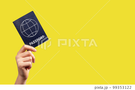 Banner with woman hand holding passport on yellow background. Tourism, going abroad concept. Identity, nationality verification. Place for text 99353122