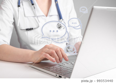 Online medical consultation. Doctor using laptop for chatting with patients remotely and giving answers about general health concerns. Woman with stethoscope sitting at table with computer 99353440