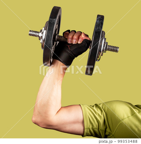 Men arm hand lifting dumb bell close up. Weights, dumbell Men arm hand lifting dumb bell close up. Weights, dumbell 99353488