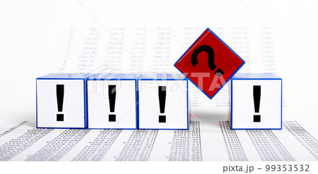 Questions and answers in business, finance. Cubes with question mark and exclamation points on statistics documents background Questions and answers in business, finance. Cubes with question mark and exclamation points on statistics documents background 99353532
