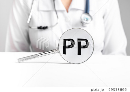 PP vitamin, word acronym through magnifying glass PP vitamin, word acronym through magnifying glass 99353666