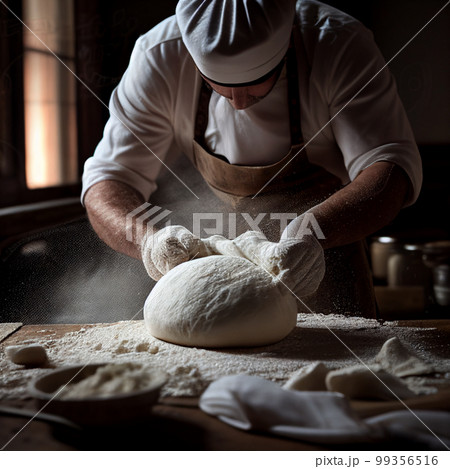 A man kneads the dough for baking, close-up, making bread, rolls the work of a baker 99356516