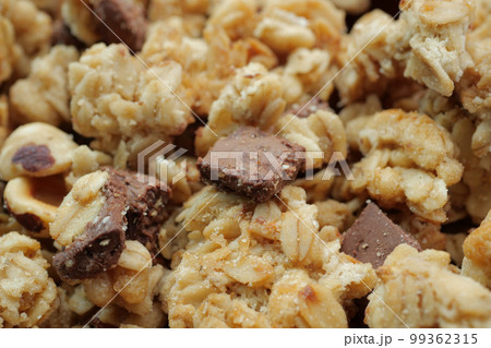 detail shot of chocolate granola Musli in a bowl, detail shot of chocolate granola Musli in a bowl, 99362315