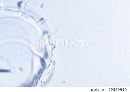 Close-up of fresh and transparent splashes of water or lotion, micellar in the form of a crown 99369910