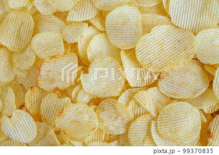 crispy potato chips snack texture background 99370835