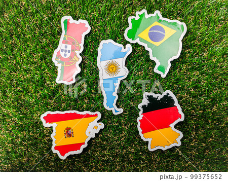 Portugal,German,Spain,Argentina and brazil flag sticker is on a green field. 99375652