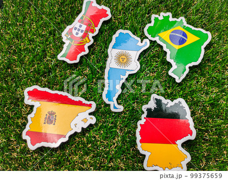 Portugal,German,Spain,Argentina and brazil flag sticker is on a green field. 99375659