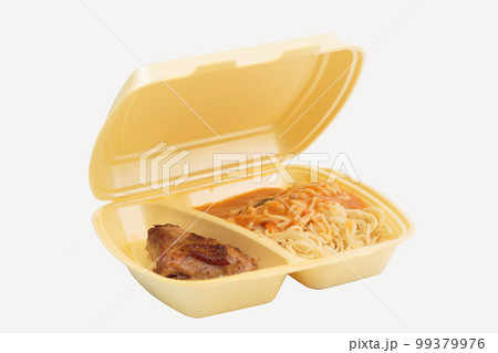 Chicken and pasta in a plastic box for delivery. 99379976