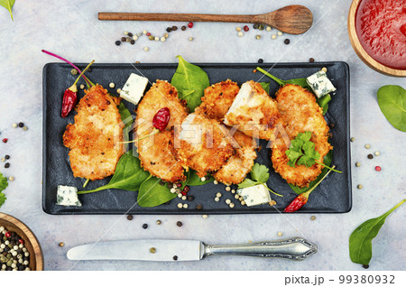 Breaded chicken breast. Breaded chicken breast. 99380932