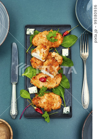 Delicious steak in breadcrumbs 99380936