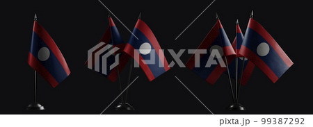 Small national flags of the Laos on a black background 99387292