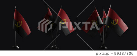 Small national flags of the Angola on a black background Small national flags of the Angola on a black background 99387306