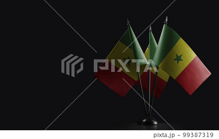 Small national flags of the Senegal on a black background Small national flags of the Senegal on a black background 99387319
