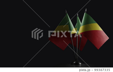 Small national flags of the Congo on a black background 99387335