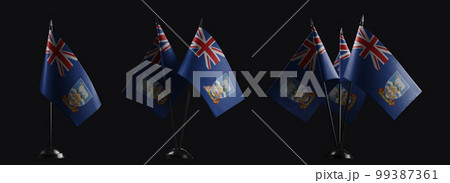Small national flags of the Falkland Islands on a black background 99387361