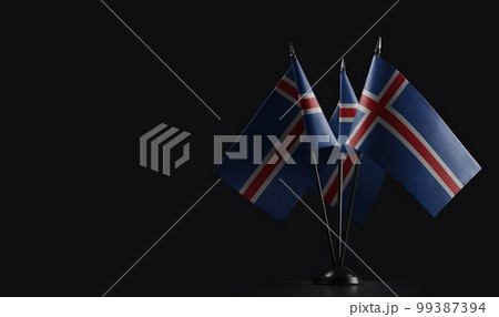 Small national flags of the Iceland on a black background Small national flags of the Iceland on a black background 99387394