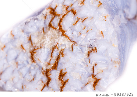 Macro mineral blue agate in the rock on white background 99387925