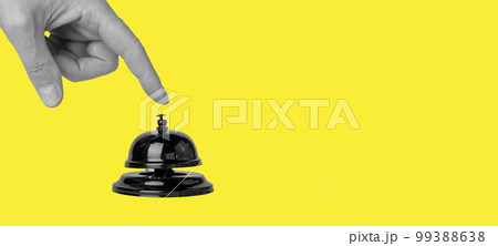 Banner with forefinger pressing on call bell on yellow background. Paying attention, alarm concept. Signal in hotel, restaurant, store. Place for text 99388638