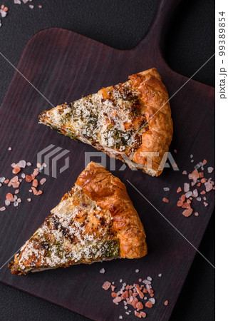 Delicious quiche with chicken, cheese, herbs, spices and herbs Delicious quiche with chicken, cheese, herbs, spices and herbs 99389854