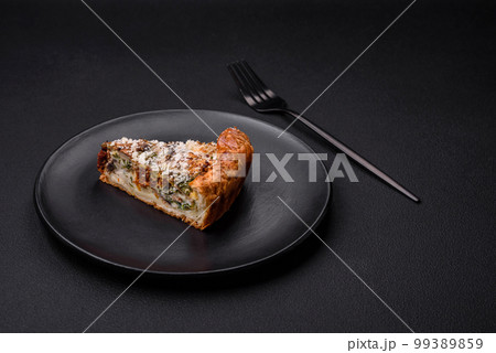 Delicious quiche with chicken, cheese, herbs, spices and herbs 99389859