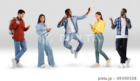 Group Of Multiethnic People Using Smartphones While Posing Over White Gradient Background Group Of Multiethnic People Using Smartphones While Posing Over White Gradient Background 99390508