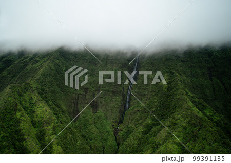 Aerial of Green Cliffs of Na Pali Coast on Kauai, Hawaii 99391135