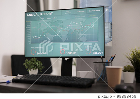 Close up view of computer screen with statistical software showing graphs of annual growth and financial performance of the company. Data analysis in modern empty office. 99393459