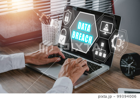 Data Breach concept, Person hand typing keyboard on office desk with data breach icon on virtual screen, Cyber security data protection business technology privacy. Data Breach concept, Person hand typing keyboard on office desk with data breach icon on virtual screen, Cyber security data protection business technology privacy. 99394006