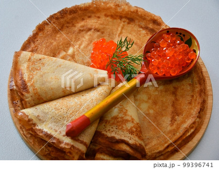 Pancakes with red caviar, cooked for Maslenitsa Pancakes with red caviar, cooked for Maslenitsa 99396741