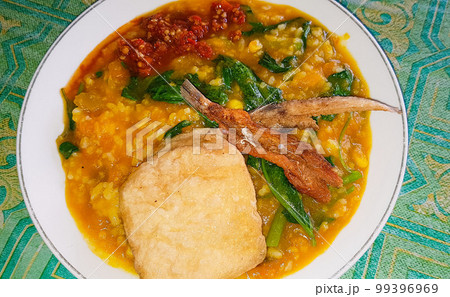 tinutuan, bubur manado, indonesian traditional porridge dish mixed of rice, pumpkin, and kangkung vegetable tinutuan, bubur manado, indonesian traditional porridge dish mixed of rice, pumpkin, and kangkung vegetable 99396969